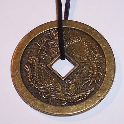 Amuleta cu moneda protectoare - remediu Feng Shui
