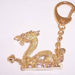 Dragon cu sfera - breloc auriu, din metal