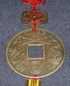 Moneda antica cu pasarea Phoenix si Dragon
