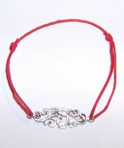 Bratara pe siret rosu, reglabil, cu simbol celtic din argint